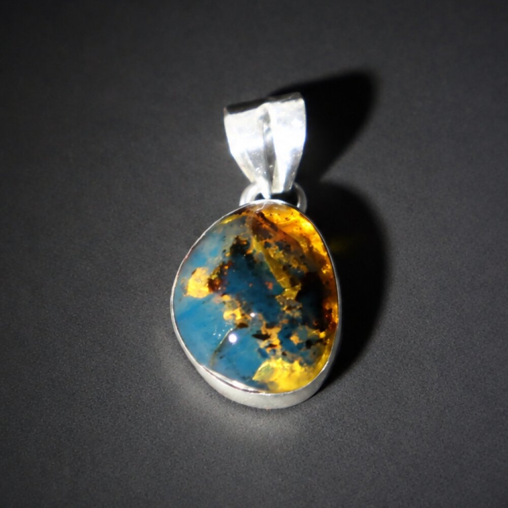 Translucent deep blue Natural Dominican Amber oval 925 Sterling Pendant 24 mm