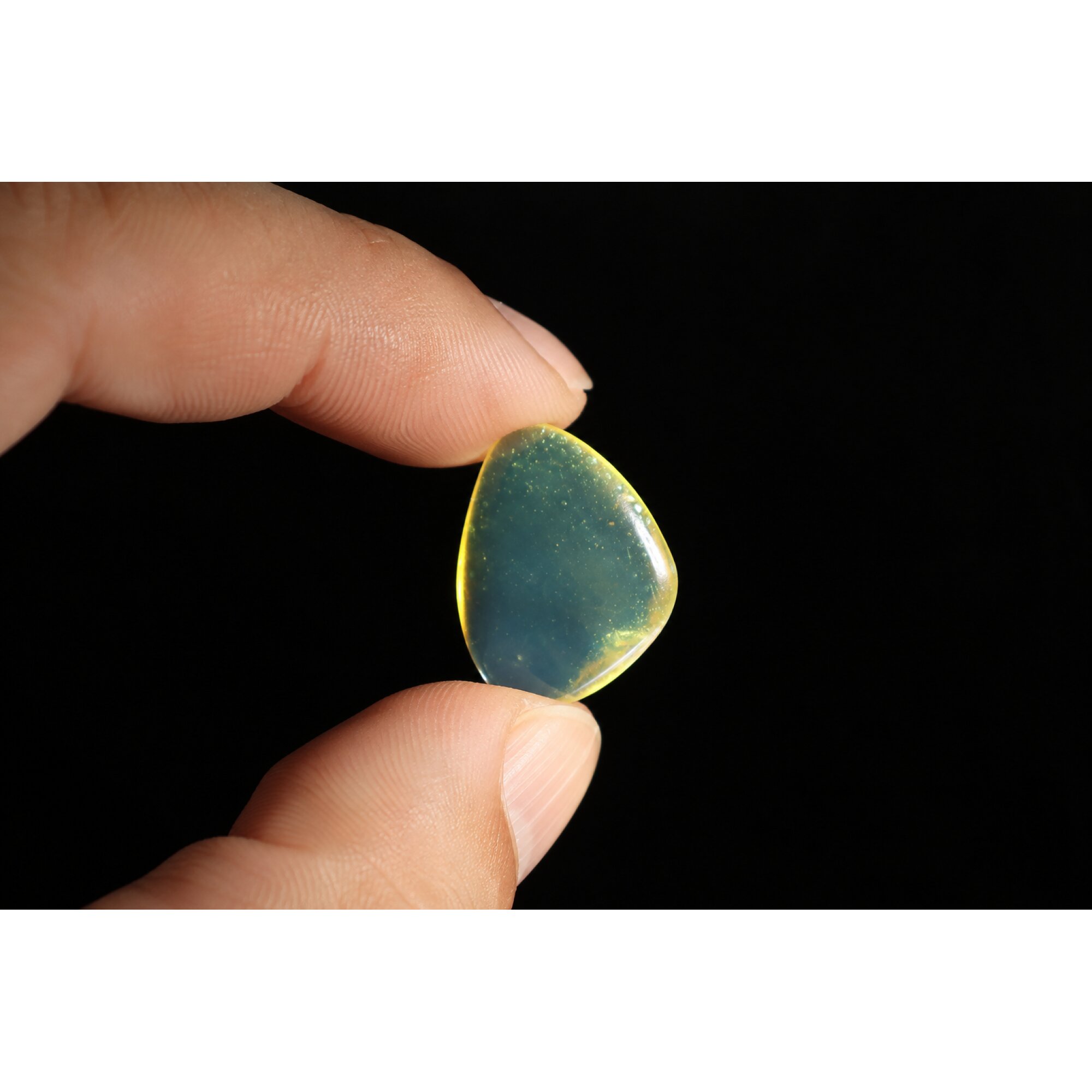 Clear royal blue Natural Dominican Amber freeform Polished Stone 25 mm – photo 5