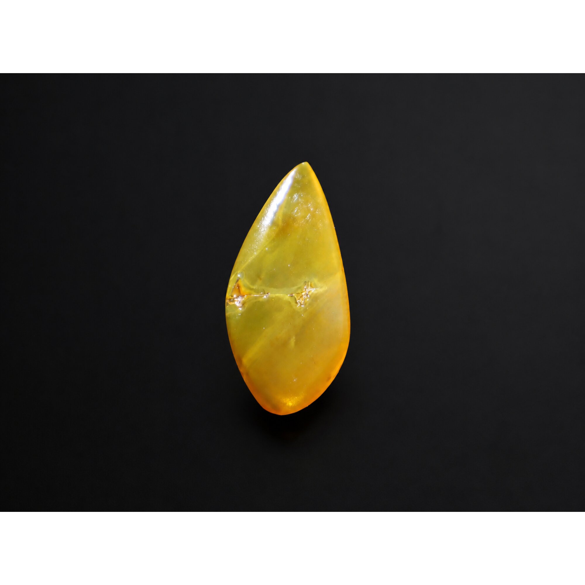 Translucent eggyolk yellow Natural Dominican Amber teardrop Polished Stone 26 mm – photo 6