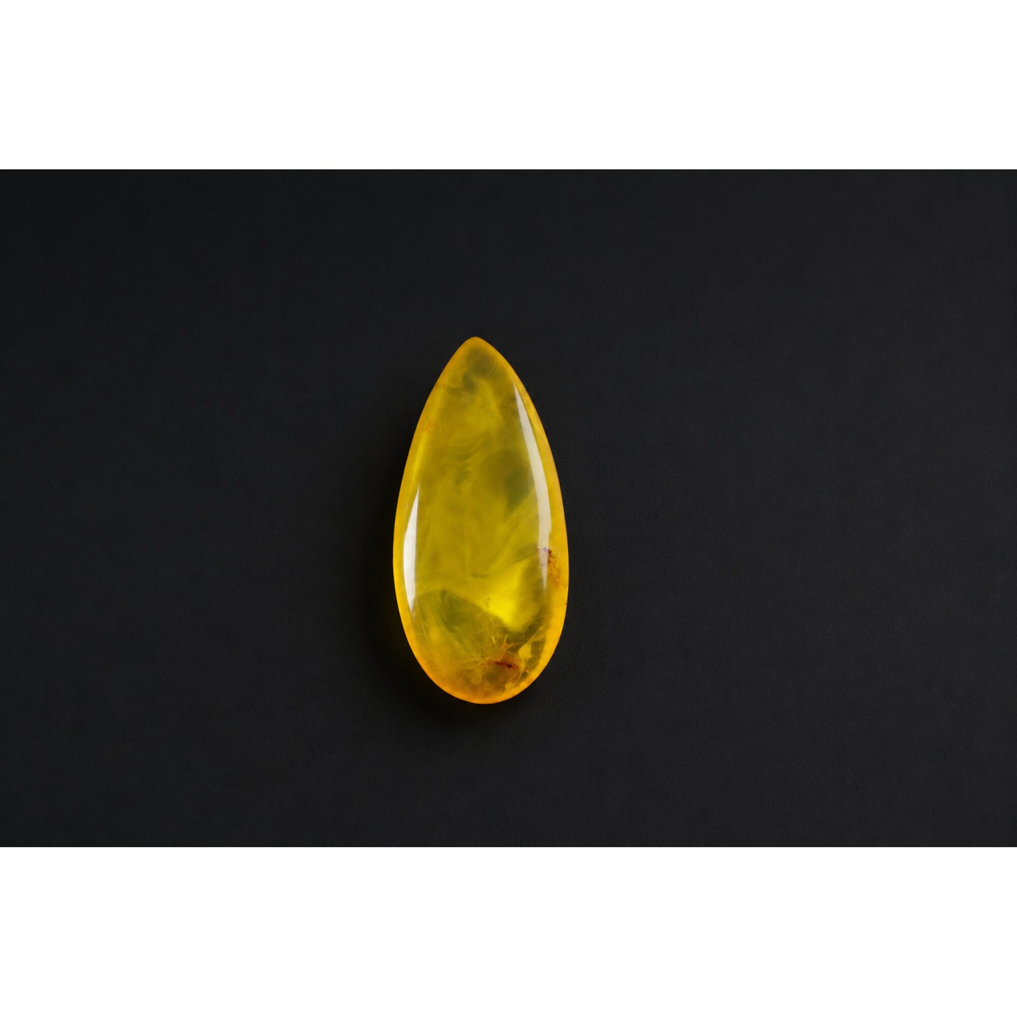 Clear eggyolk yellow Natural Dominican Amber teardrop Polished Stone 27 mm – photo 2