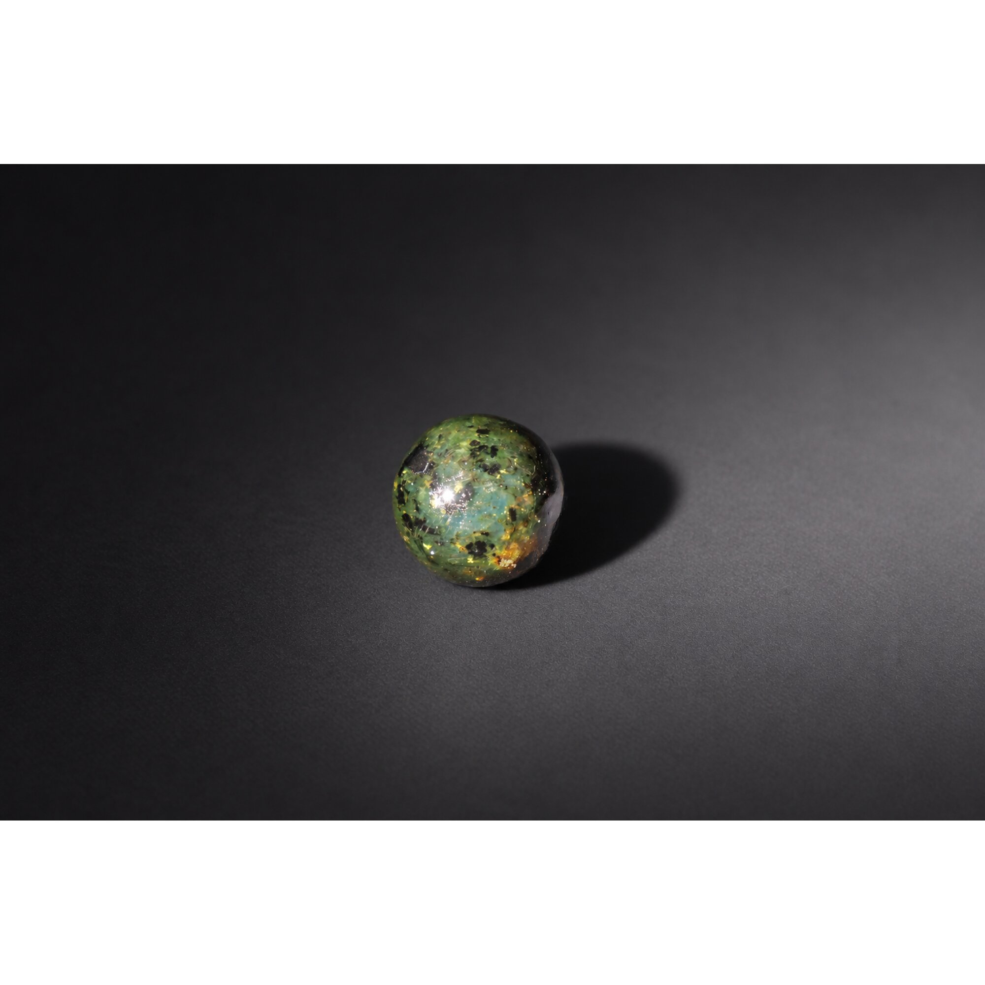 Untreated olive green blue Dominican amber sphere/ball 20mm – photo 2