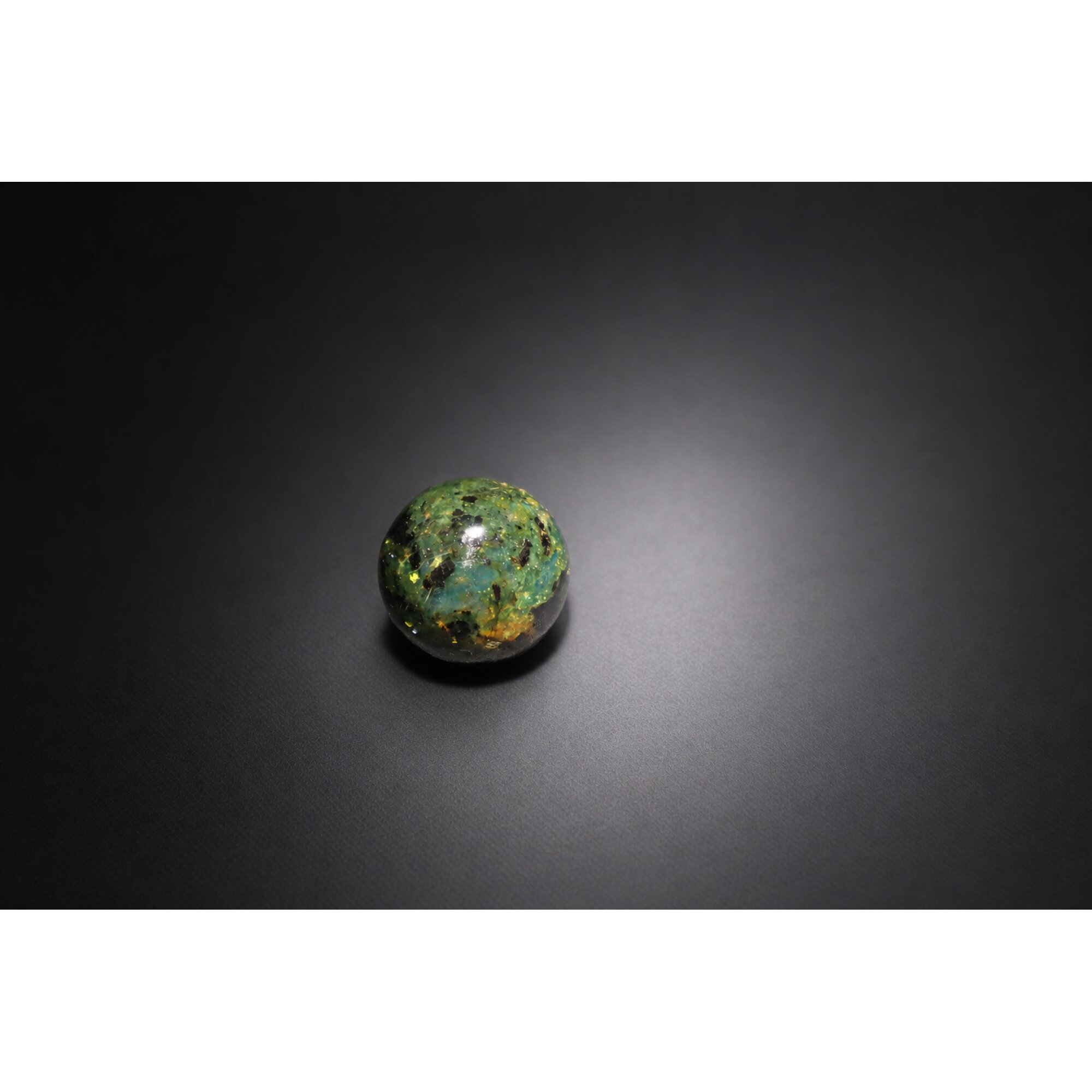 Untreated olive green blue Dominican amber sphere/ball 20mm – photo 4