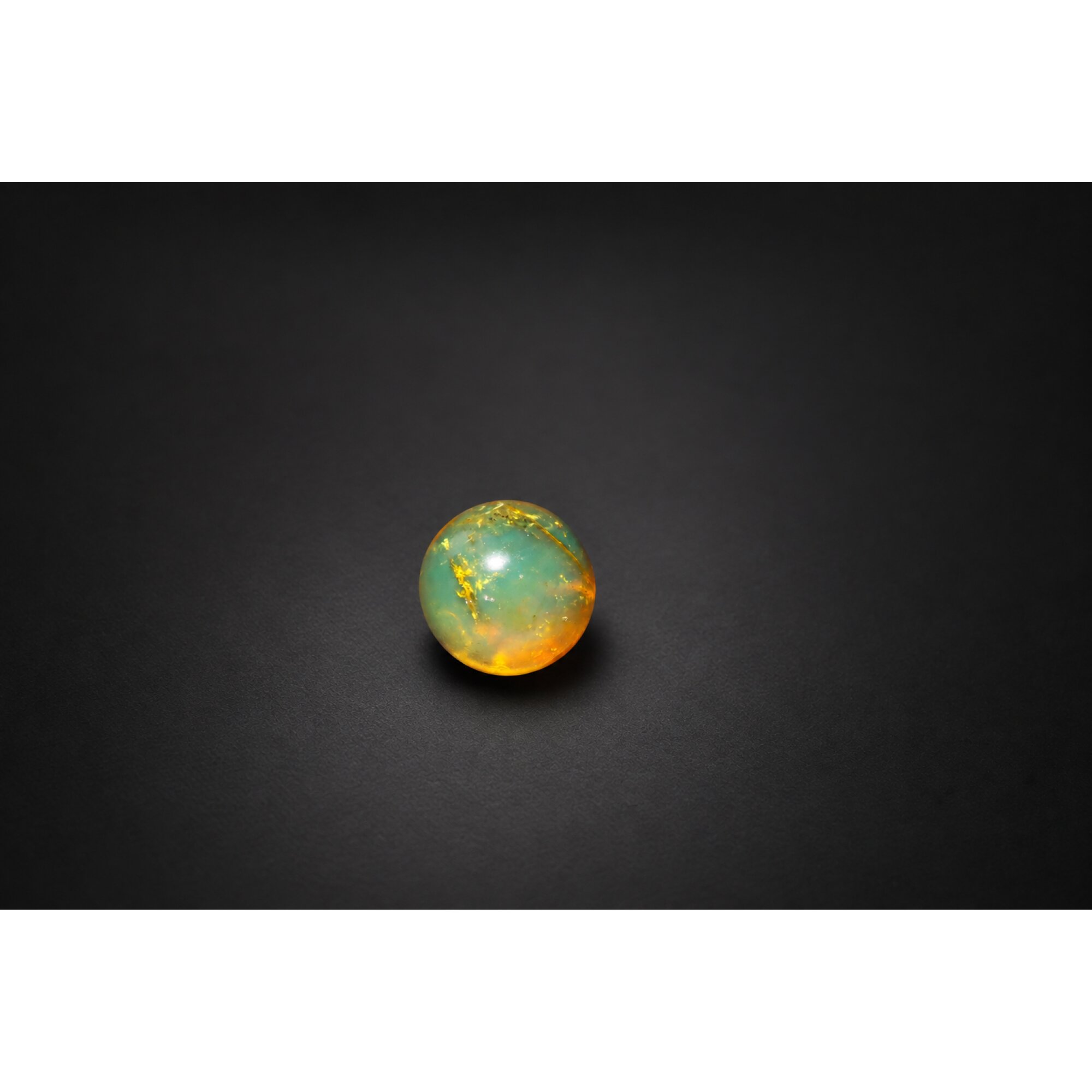 Earth mined yellow blue Dominican amber sphere/ball 17.6mm – photo 3