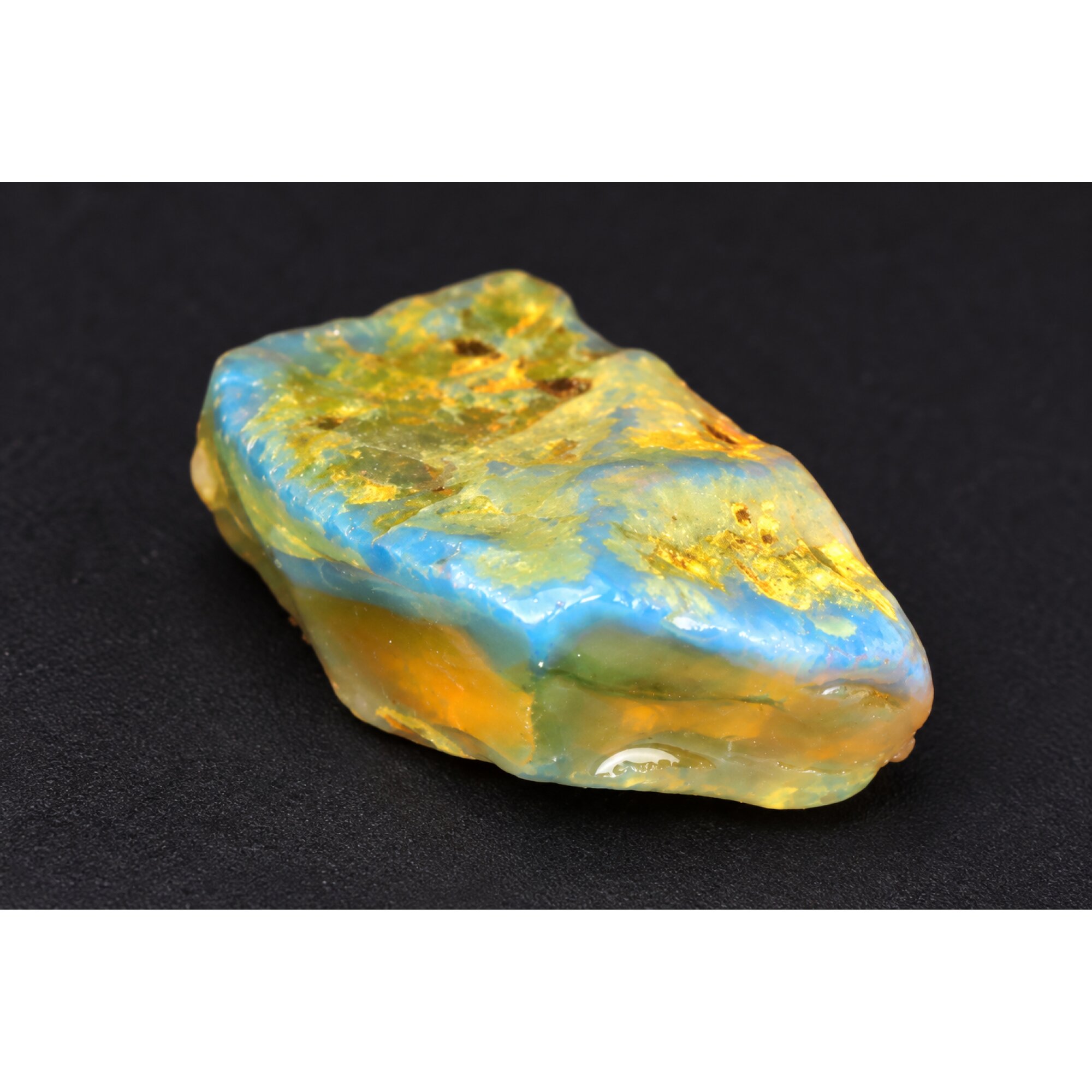 Naturally formed orange blue rough specimen Dominican amber 38mm – photo 10