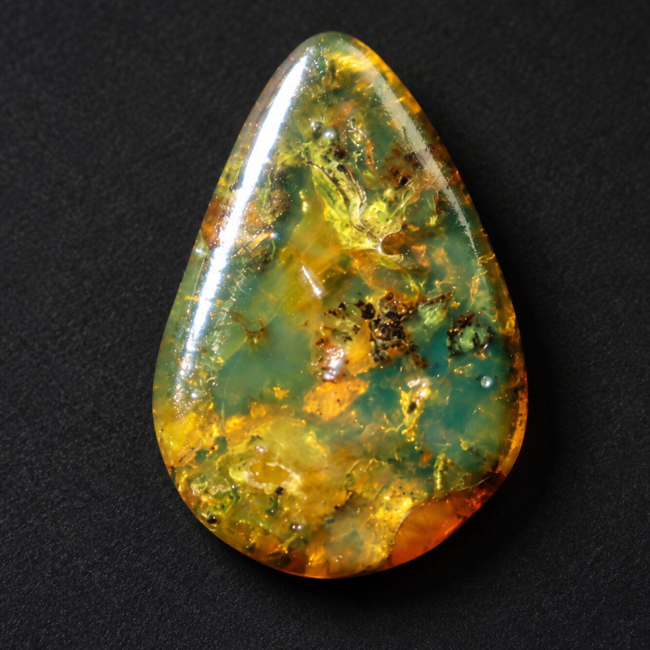 Authentic green blue polished Dominican amber 1.4g