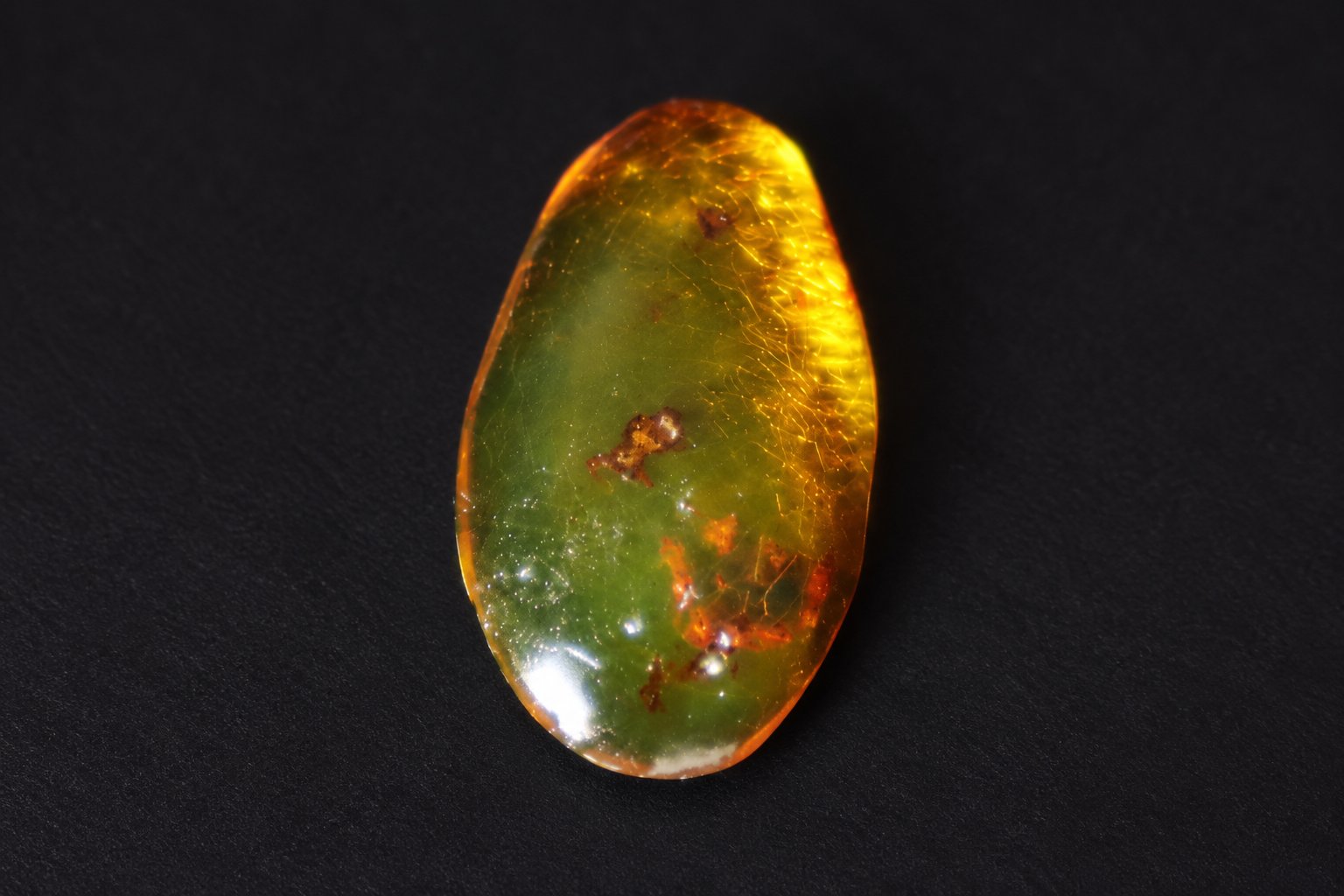 Authentic deep green Dominican amber cabochon – photo 3