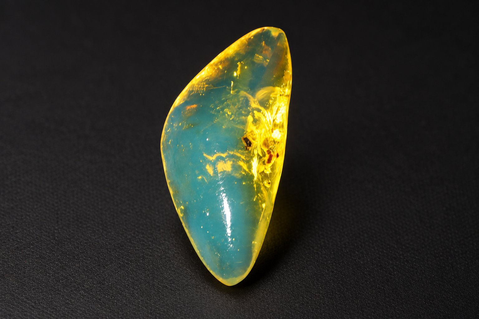 Genuine orange green polished Dominican amber